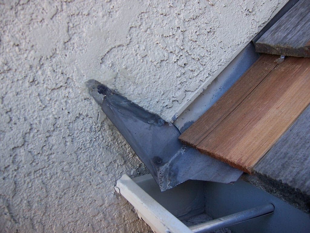 Installing Proper Kickout Flashing - Roof repair and roofer installation of kickout flashing