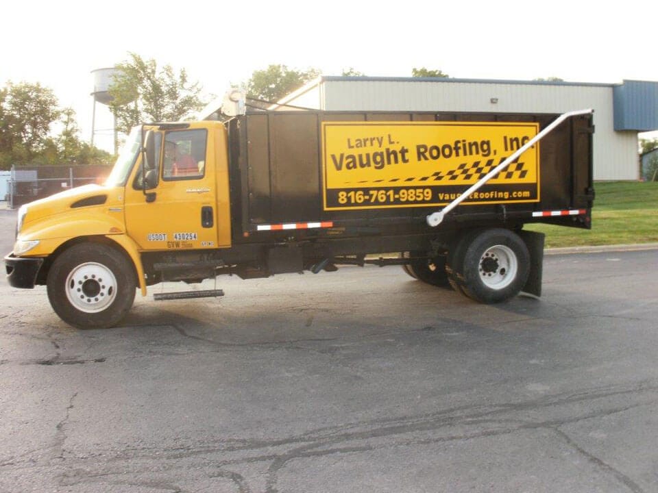 Vaught Roofing Photo Gallery: Yellow dump truck 02